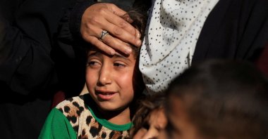A mourner reacts during the funeral of Palestinians killed by Israeli fire while seeking aid in northern Gaza, Palestine, June 18, 2025. (Reuters Photo)