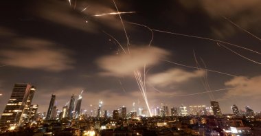 Israeli air defense systems are activated to intercept Iranian missiles over Tel Aviv, Israel, June 18, 2025. (AFP Photo)