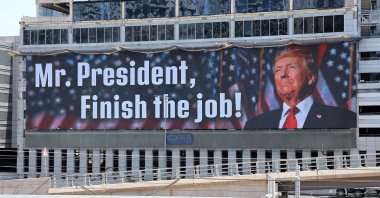 A message addressed to U.S. President Donald Trump reading, &quot;Mr. President, finish the job,&quot; is pictured, Tel Aviv, Israel, June 18, 2025. (AFP Photo)
