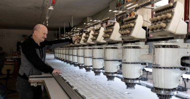 An employee works at a textile factory, Istanbul, Türkiye, Nov. 15, 2023. (Reuters Photo)