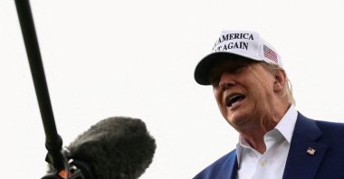 U.S. President Donald Trump speaks to members of the media during the installation of a new flagpole on the South Lawn at the White House in Washington, D.C., U.S., June 18, 2025. (Reuters Photo)