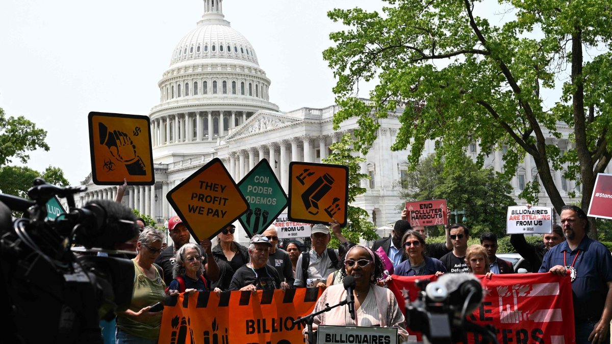 Protesters gather to demonstrate before a press conference to call on Republican senators to vote against the budget and policy package passed by House Republicans, also known as the &quot;One Big Beautiful Bill Act,&quot; on Capitol Hill, Washington, U.S., June 3, 2025. (AFP Photo)