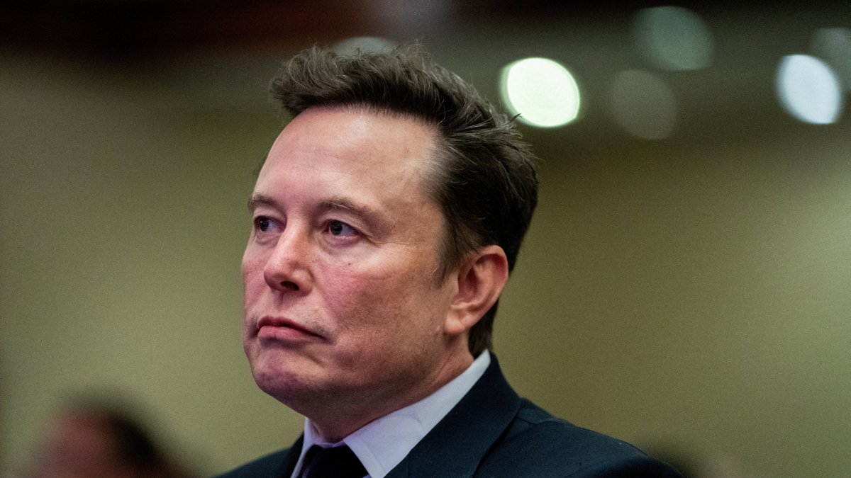 Tesla CEO and X owner Elon Musk listens as U.S. President-elect Donald Trump speaks during a meeting with House Republicans at the Hyatt Regency hotel in Washington, D.C., U.S. Nov. 13, 2024. (Reuters File Photo)