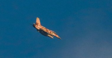 An Israeli F-16 fighter aircraft flies over Jabalia, northern Gaza Strip, Palestine, June 17, 2025. (AFP Photo)
