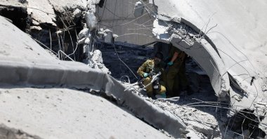 Emergency workers inspect an impact site at Soroka Medical Center, in Beersheba, Israel, June 19, 2025. (Reuters Photo)