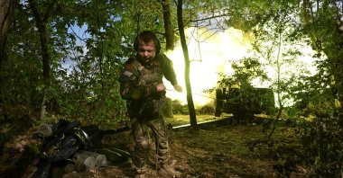 A service member of the 110th Separate Brigade of the Territorial Defense Forces of the Ukrainian Armed Forces fires a howitzer towards Russian troops, amid Russia&#039;s attack on Ukraine, at a front line in Zaporizhzhia region, Ukraine, June 16, 2025. (Reuters Photo)