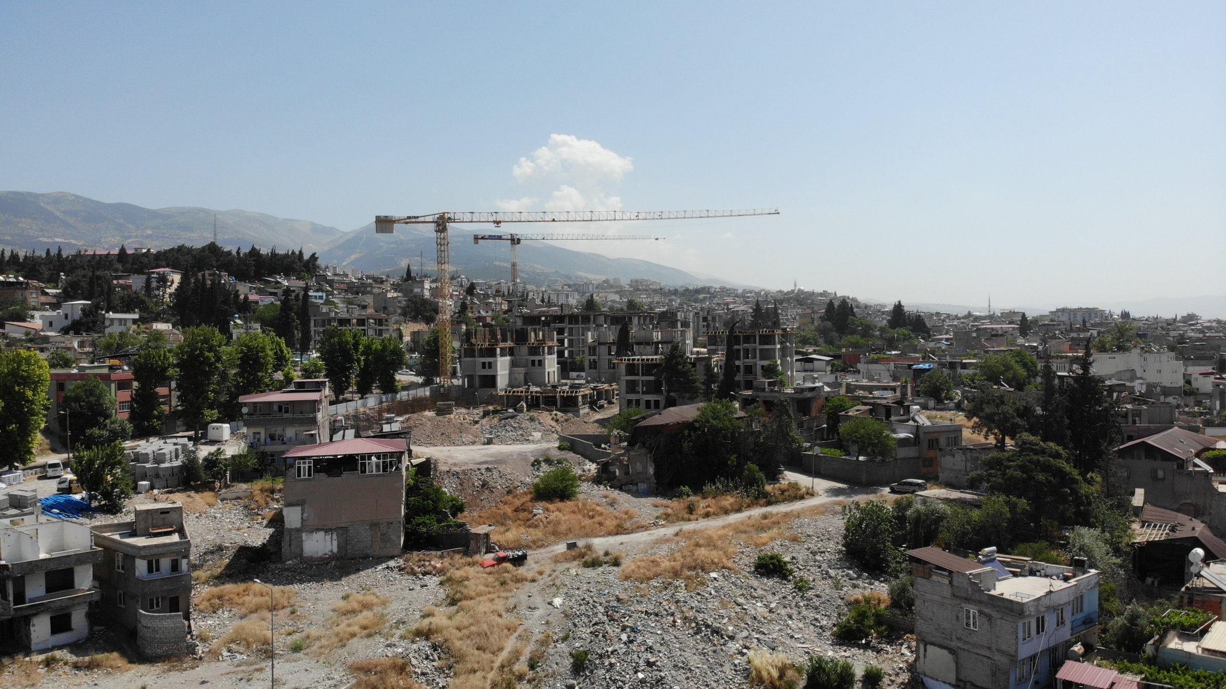 Construction cranes are seen as part of rebuilding efforts following the Feb. 6, 2023 earthquakes in Kahramanmaraş province, southeastern Türkiye, May 29, 2025. (IHA Photo)