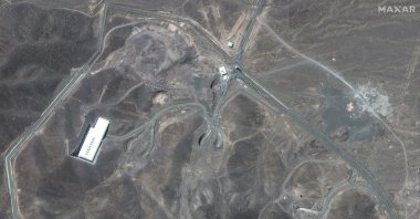This satellite image shows vehicles at Fordo enrichment facility in Iran, June 19, 2025. (AP Photo)