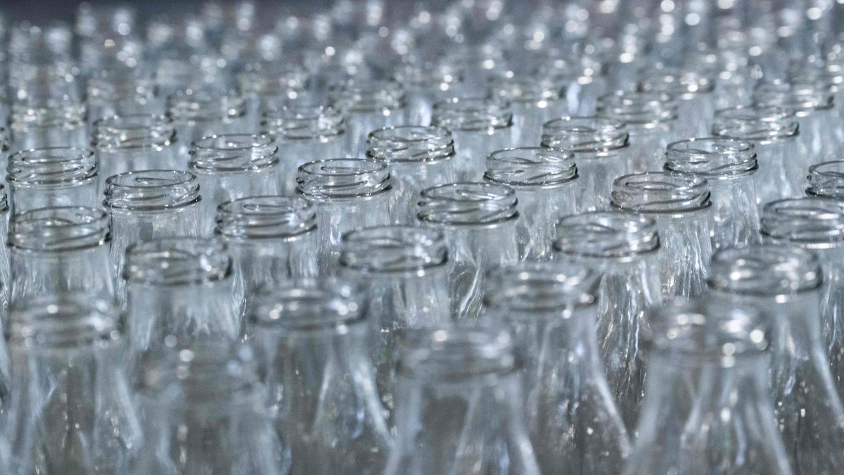 Cleaned bottles are seen at the &quot;Bout a Bout&quot;  washing  center for reusable glass bottles, in Carquefou, near Nantes, western France, on June 12, 2025. (AFP Photo)