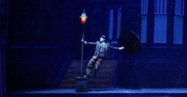 A scene from “Singin’ in the Rain,” performed by the Samsun State Opera and Ballet at the Atatürk Cultural Center, Samsun, Türkiye, June 21, 2025. (Photo by Funda Karayel)