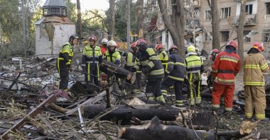 Emergency services at the site of a rocket strike on a five-storey residential building, after a massive overnight attack on Kyiv, Ukraine, June 23, 2025. (EPA Photo)