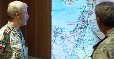 Iranian Army commander-in-chief, Amir Hatami (L), attends a meeting in the Iranian Army&#039;s War Command Room at an unknown location, June 23, 2025. (EPA Photo)