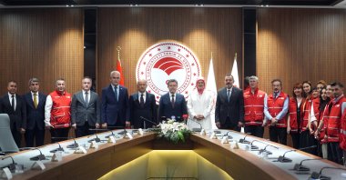 Minister of Agriculture and Forestry Ibrahim Yumaklı, Turkish Red Crescent President Fatma Meriç Yılmaz and officials, meet at the General Directorate of Forestry, Ankara, Türkiye, June 23, 2025. (AA Photo)