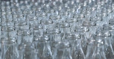 Cleaned bottles are seen at the &quot;Bout a Bout&quot;  washing  center for reusable glass bottles, in Carquefou, near Nantes, western France, on June 12, 2025. (AFP Photo)