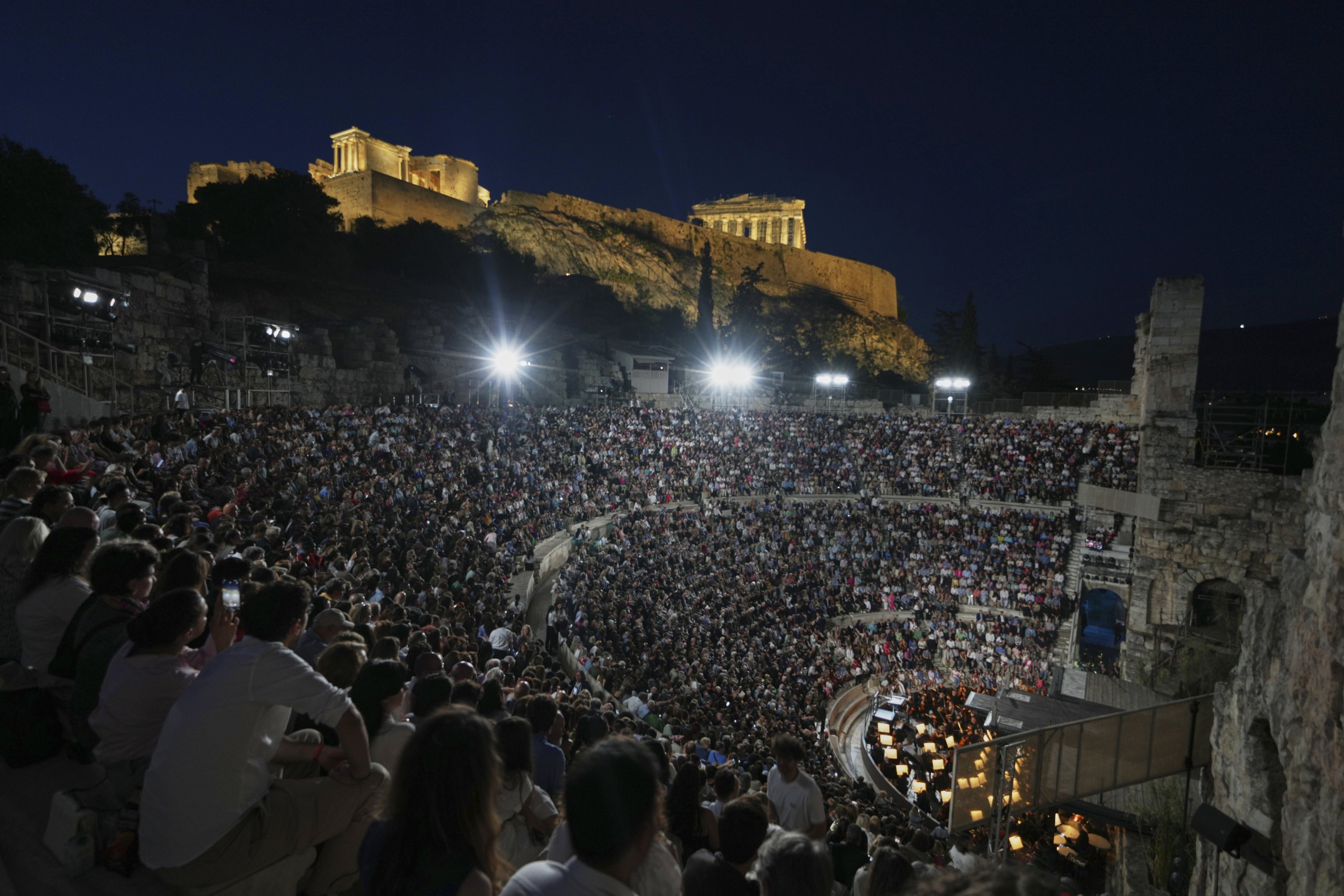 Spectators wait for Giacomo Puccini's