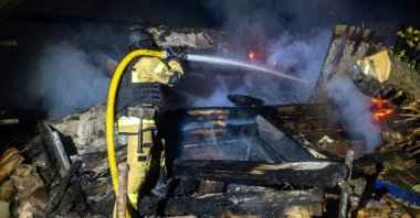 A rescuer works at a site following a Russian drone attack at a location in Sumy, northeastern Ukraine, June 24, 2025. (Reuters Photo)