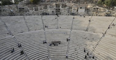 Tourists watch the ushers as they prepare the Odeon of Herodes Atticus ahead of the dress rehearsal of Giacomo Puccini's "Turandot" by the Greek National Opera during the 70th Athens Epidaurus Festival, Athens, Greece, May 30, 2025. (AP Photo)