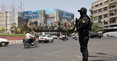 A security guard stands on a street, during early hours of cease-fire, Tehran, Iran, June 24, 2025. (Reuters Photo)