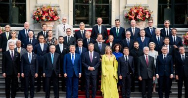 NATO country leaders, pose for a family photo as they attend a social dinner at the &#039;Huis ten Bosch&#039; Royal Palace during a NATO Heads of State and Government summit in The Hague, June 24, 2025. (AFP Photo)