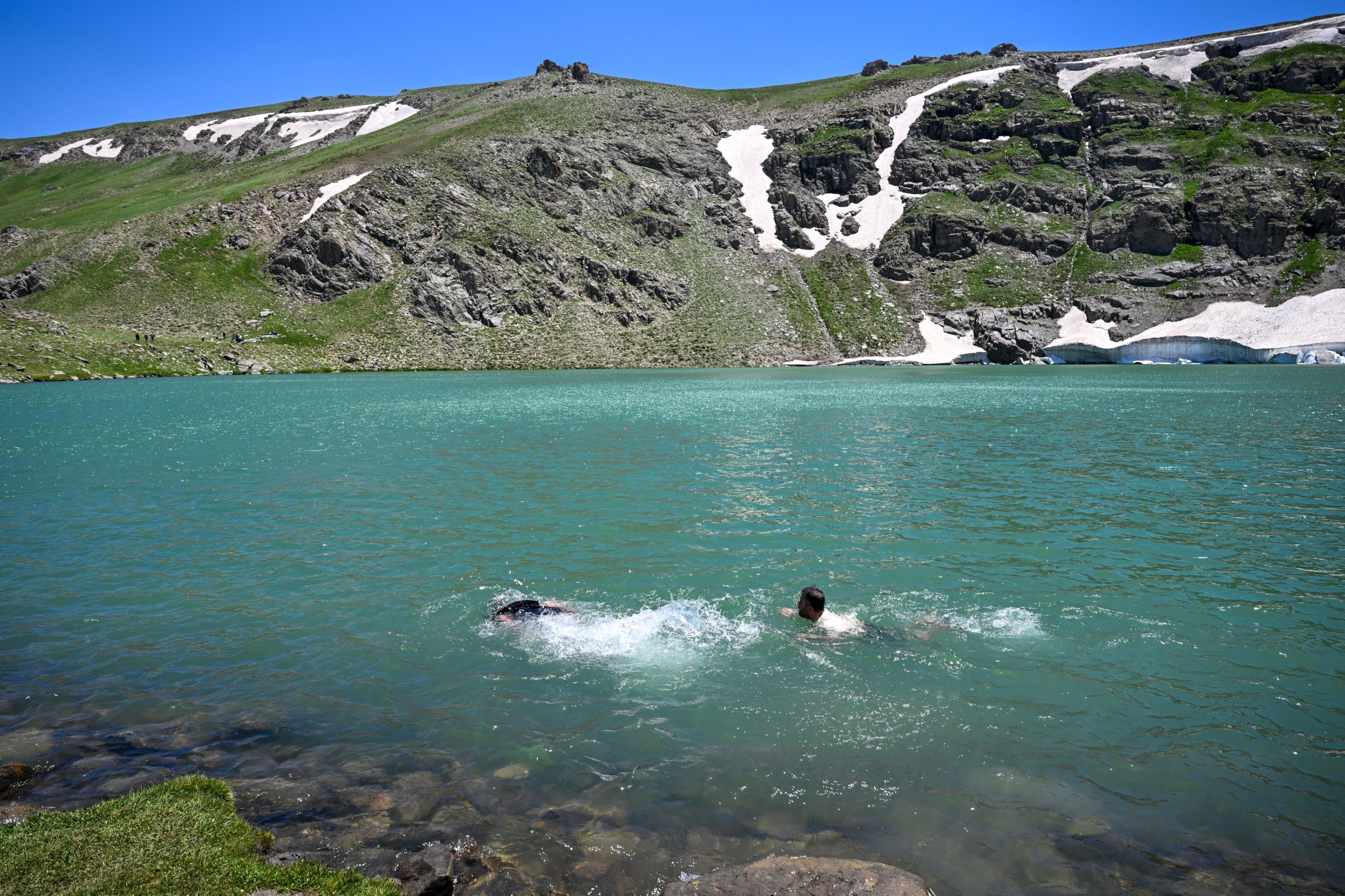 Visitors swim at Çalyan Lake in Van, eastern Türkiye, June 14, 2025. (AA Photo)