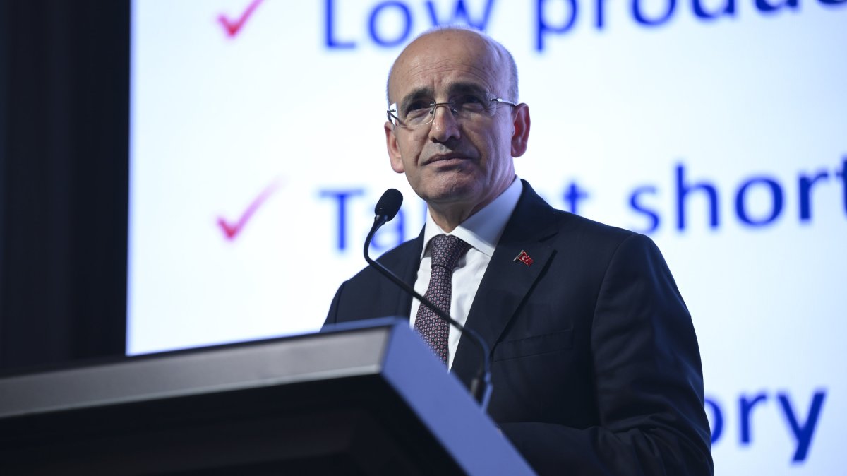 Finance Minister Mehmet Şimşek delivers a speech at an event, Istanbul, Türkiye, May 30, 2025. (AA Photo)