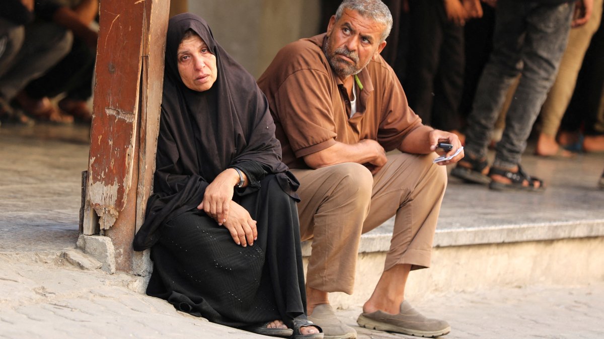 Mourners react during the funeral of Palestinians killed in an Israeli airstrike on a house, at al-Ahli Arab Baptist hospital, in Gaza City, Palestine, June 25, 2025. (Reuters Photo)
