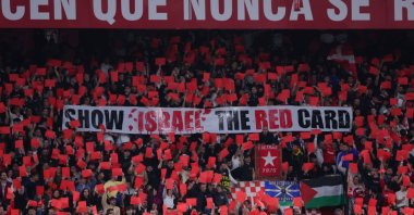 Fans hold a sign saying, "Show Israel the Red Card" during the La Liga match between Sevilla FC and RCD Mallorca at Estadio Ramon Sanchez Pizjuan, Seville, Spain, Feb. 24, 2025. (Getty Images Photo)