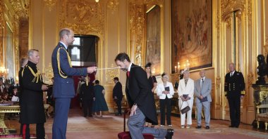 Gareth Southgate, from Harrogate, lately manager of the England National Football Team, is made a Knight Bachelor by Britain&#039;s Prince William at Windsor Castle, Windsor, U.K., June 25, 2025. (AP Photo)