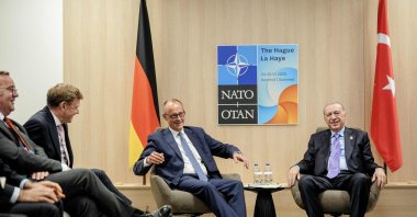 German Chancellor Friedrich Merz and President Recep Tayyip Erdoğan (R) pose at their meeting, The Hague, the Netherlands, June 25, 2025. (AFP Photo)