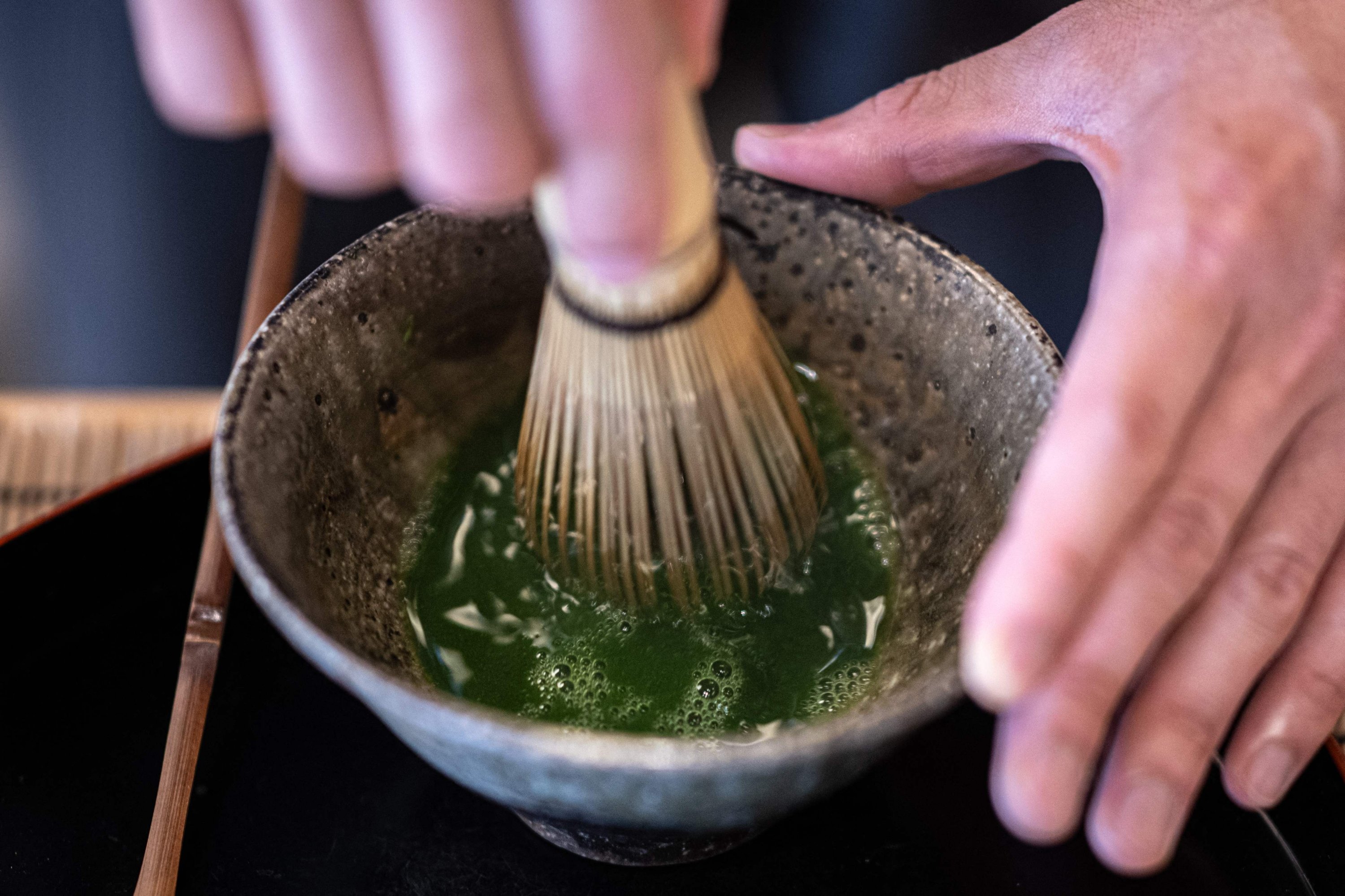 Jugetsudo tea store manager Shigehito Nishikida makes a bowl of matcha, Tokyo, Japan, June 6, 2025. (AFP Photo)