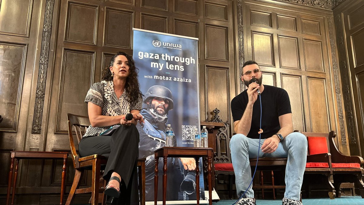 Palestinian photographer and Instagram star Motaz Azaiza (R) speaks during a discussion with scholar Noura Erakat (L) during an event at the First Unitarian Church of Philadelphia to collect donations for the UNRWA, Philadelphia, Pennsylvania, U.S., June 23, 2025. (AFP Photo)