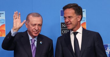 NATO Secretary-General Mark Rutte and President Recep Tayyip Erdoğan react as they pose for a photo during a NATO summit, The Hague, Netherlands, June 25, 2025. (Reuters Photo)
