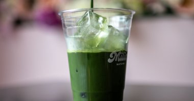 A staff member of Milia Matcha prepares a matcha drink, Tokyo, Japan, May 31, 2025. (AFP Photo)