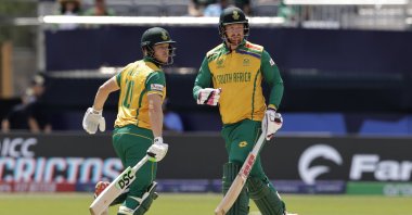 South Africa&#039;s David Miller (L) and Heinrich Klaasen run between the wickets to score during the ICC Men&#039;s T20 World Cup cricket match between Bangladesh and South Africa at the Nassau County International Cricket Stadium, Westbury, New York, U.S., June 10, 2024. (AP Photo)