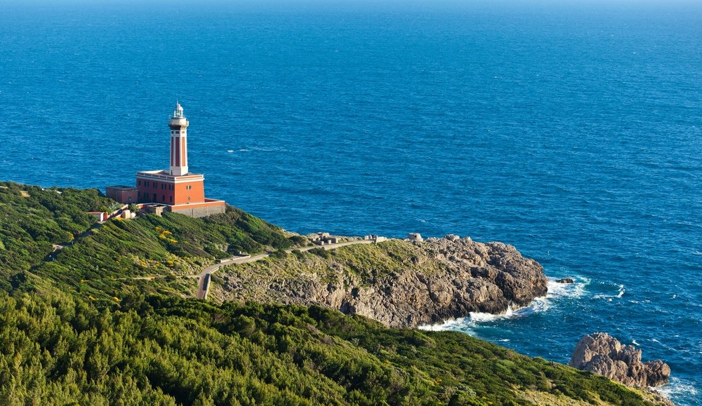 An aerial view of the Faro di Punta Carena Lighthouse, Anacapri, Capri, Italy. (Shutterstock Photo)