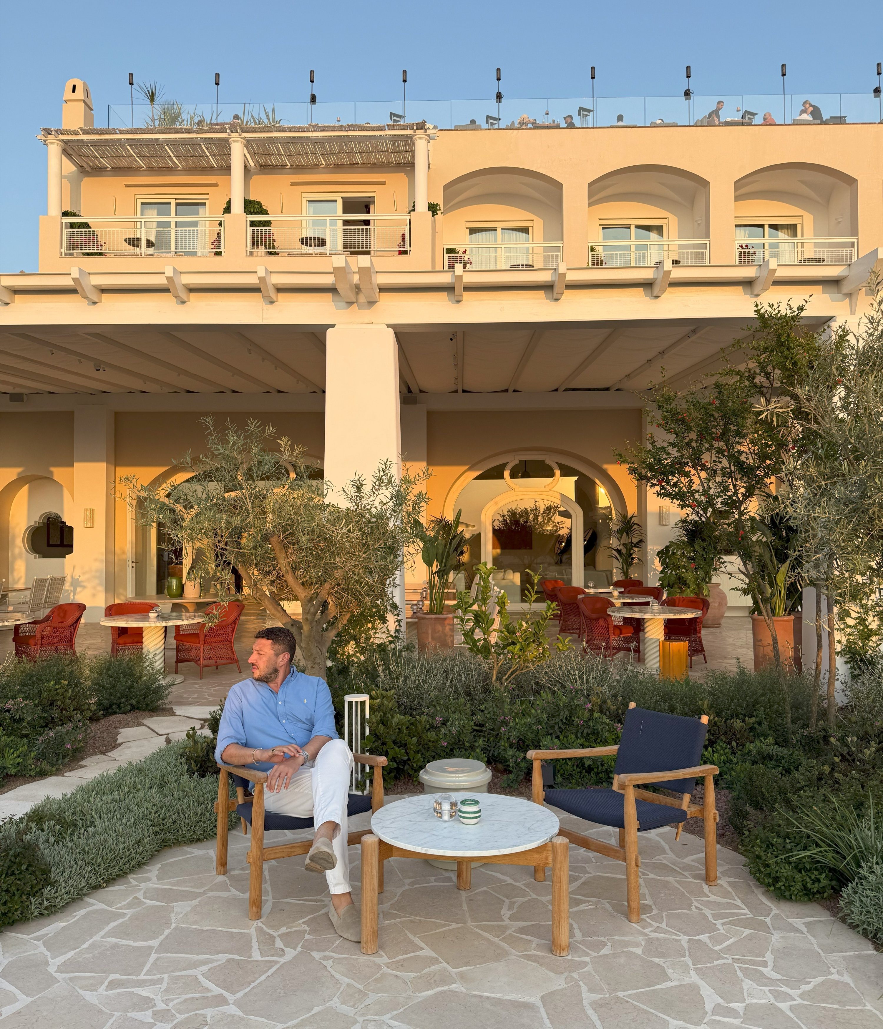 Ilker Topdemir poses in the garden at Capri Palace Jumeirah, Capri, Italy, June 10, 2025. (Photo by İlker Topdemir)