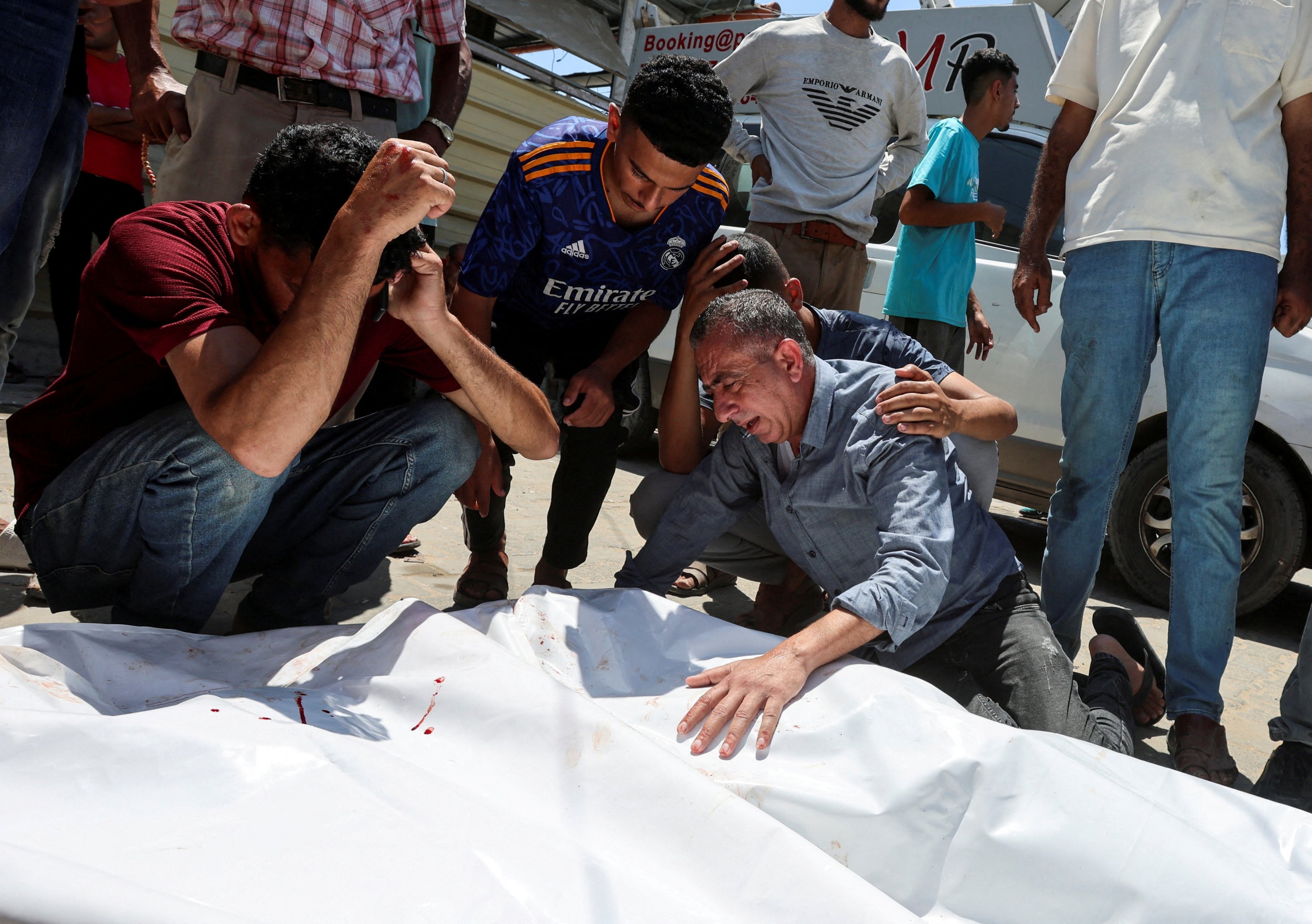 Israeli strike on Gaza aid site kills 18 as civilians battle hunger