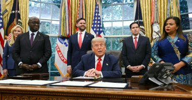 U.S. President Donald Trump speaks during a meeting with Democratic Republic of the Congo Foreign Minister Thérèse Kayikwamba Wagner (R) and Rwandan Foreign Minister Olivier Nduhungirehe (2nd-L) in the Oval Office of the White House in Washington, DC, U.S., June 27, 2025. (AFP Photo)