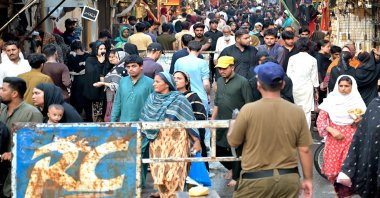 A Pakistani policeman keeps watch on a roadside during the month of Muharram, in Lahore, Pakistan, June 27, 2025. (EPA Photo)