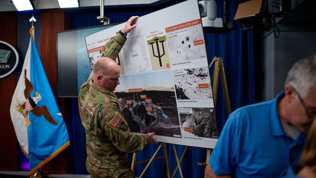 A poster of the Fordo Fuel Enrichment Plant is removed following a news conference at the Pentagon, Arlington, Virginia, U.S., June 26, 2025. (AFP Photo)