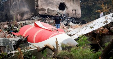 A fire officer stands next to the crashed Air India Boeing 787-8 Dreamliner aircraft, in Ahmedabad, India, June 13, 2025. (Reuters Photo)