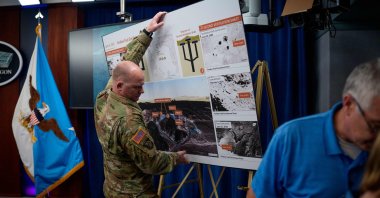 A poster of the Fordo Fuel Enrichment Plant is removed following a news conference at the Pentagon, Arlington, Virginia, U.S., June 26, 2025. (AFP Photo)