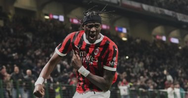 AC Milan&#039;s Tammy Abraham celebrates after he scored his side&#039;s first goal during an Italian Cup semifinal first leg match between AC Milan and Inter Milan at the San Siro stadium, Milan, Italy, April 2, 2025. (AP Photo)