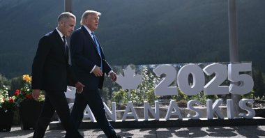 Canadian Prime Minister Mark Carney and U.S. President Donald Trump arrive for a family photo during the Group of Seven (G7) Summit at the Kananaskis Country Golf Course in Kananaskis, Alberta, Canada, June 16, 2025. (AFP Photo)