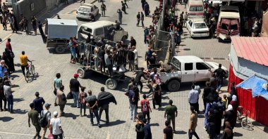 Palestinians carry casualties wounded by Israeli fire while waiting for aid, according to Gaza’s health ministry, at Nasser Hospital in Khan Younis, southern Gaza Strip, June 30, 2025. (Reuters Photo)