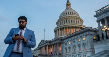 Senate staffers work in front of the U.S. Capitol as Republican lawmakers struggle to pass U.S. President Donald Trump&#039;s sweeping spending and tax bill, on Capitol Hill, Washington, U.S., June 30, 2025. (Reuters Photo)