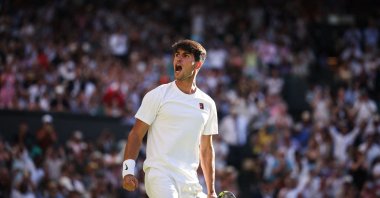 Spain&#039;s Carlos Alcaraz celebrates after winning against Italy&#039;s Fabio Fognini during their men&#039;s singles first round tennis match on the first day of the 2025 Wimbledon Championships at the All England Lawn Tennis and Croquet Club in Wimbledon, London, U.K., June 30, 2025. (AFP Photo)