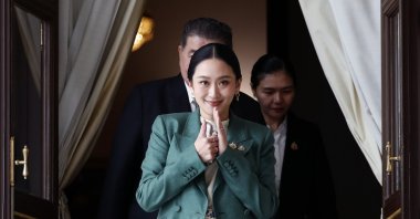 Thai Prime Minister Paetongtarn Shinawatra performs a traditional Thai greeting to the media after the Constitutional Court suspended her from office, at Government House in Bangkok, Thailand, July 1, 2025. (EPA Photo)