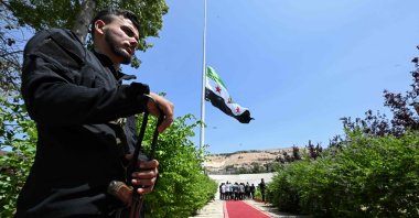 A large Syrian flag is raised on a pole at Tishreen Park in Damascus, Syria, June 4, 2025. (AFP Photo)