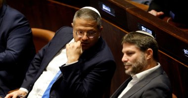 Right-wing Knesset members Itamar Ben-Gvir and Bezalel Smotrich attend a special session at the Knesset, Israel's parliament, to approve and swear in a new right-wing government, in Jerusalem Dec. 29, 2022. (Reuters File Photo)